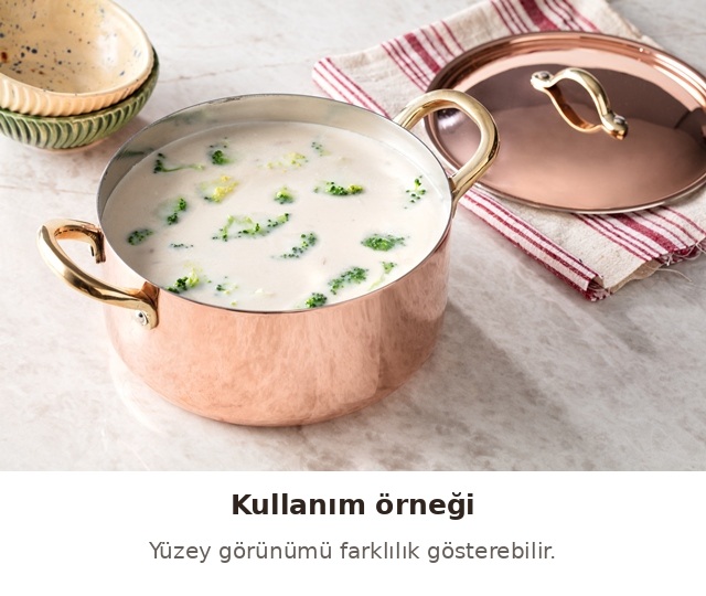 Modern Bakır tencerede yemek sunumu — kullanım örneği; yüzey görünümü farklılık gösterebilir.